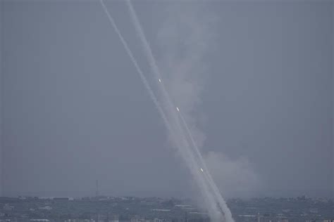 Major airlines suspend flights in Israel after a massive attack by Hamas ignites heavy fighting